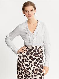 White ruffle-front shirt