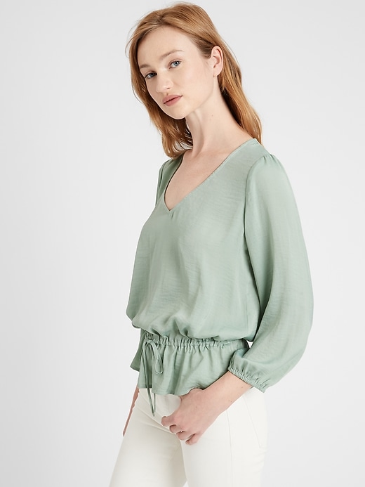 Banana Republic Satin Peplum Top. 1